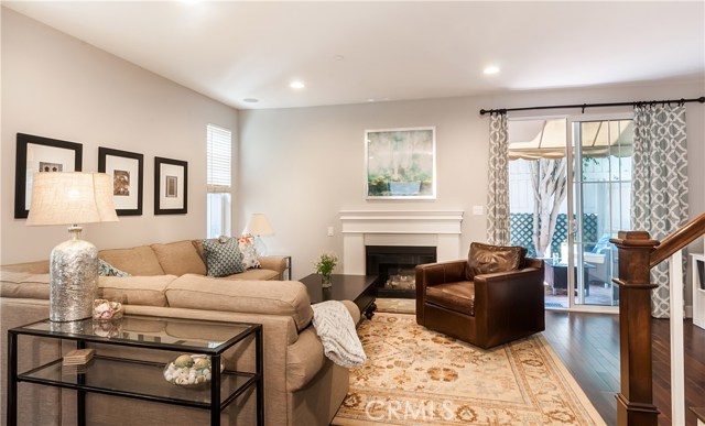 A siding glass door, located just off the living area, leads to a private back patio.