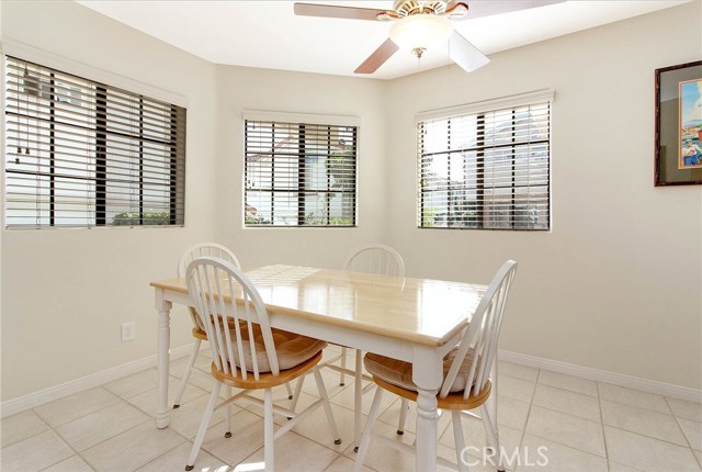 Eating area of the kitchen leading to the family room.