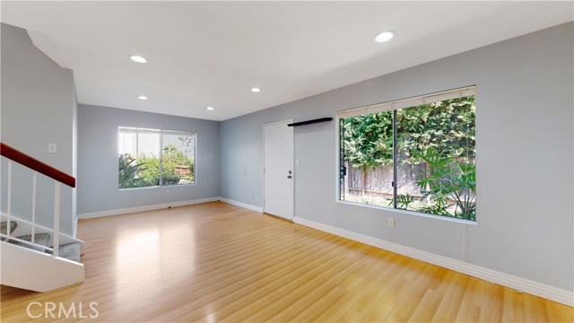 Front door leads out to a quiet walk way