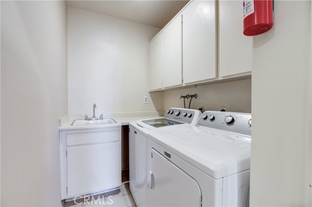 Laundry room downstairs next to the bedrooms