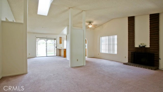 Enter to Living Room.  Dining room to right, Family Room to back, sliding door