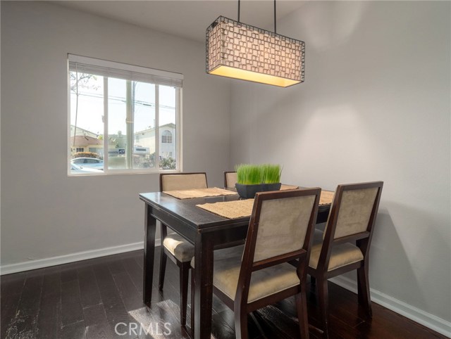 Dining Room with Custom Light Fixture, Great Natural Light Streams in.
