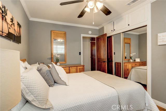 Bedroom #1 with mirrored closet doors