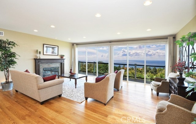 Very large luxurious living room with spectacular view of the ocean golf course