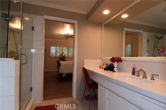 Another view of the master bathroom looking toward the master bedroom.  Nice built-in vanity area!