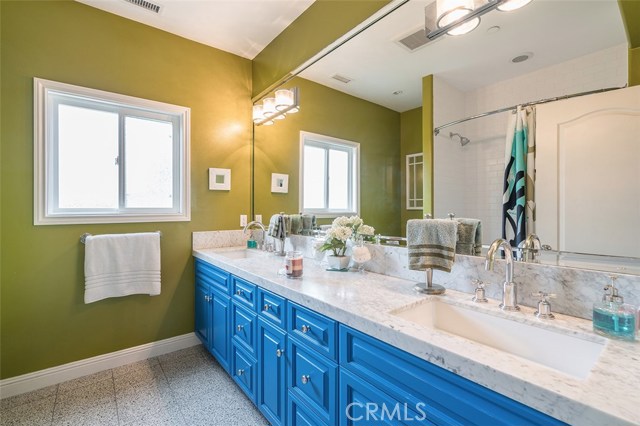 Custom painted full bathroom located on second level with all bedrooms