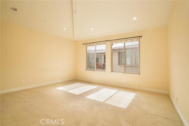 Master bedroom with vaulted ceilings