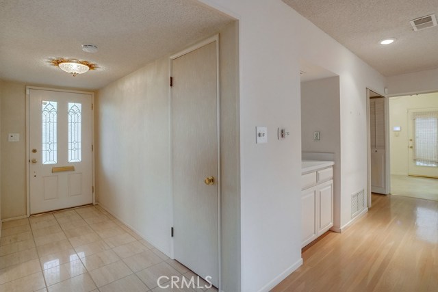 Front Door entry way looking into family room.