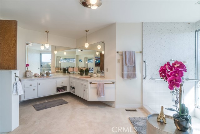 Double sink vanity and plenty of lighting ...original fixtures