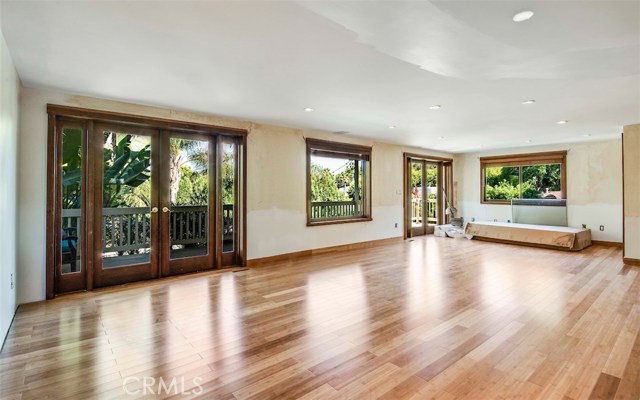 Detached 2nd level space with kitchenette and half bath. 1st floor 1 bed guest suite not pictured.