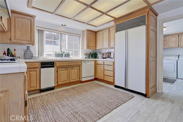 Kitchen Area with View to Adjacent Laundry Room