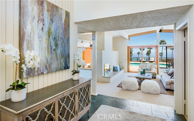 Dramatic entry with slate floor and view