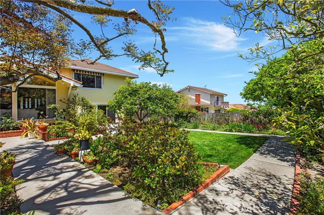 Park like yard with rose gardens and fruit trees