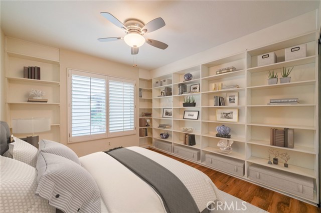 Bedroom #2 with built in shelving - Virtually staged.