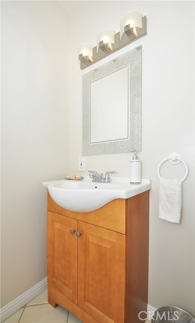 1/2 bath located in laundry room off kitchen