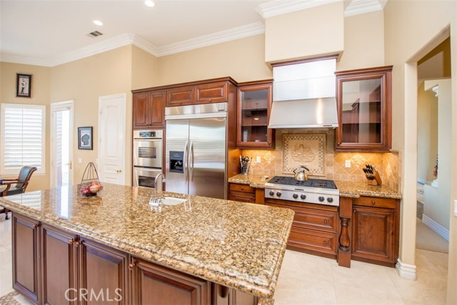 Glass Cabinet Doors and Tile Back Splash.