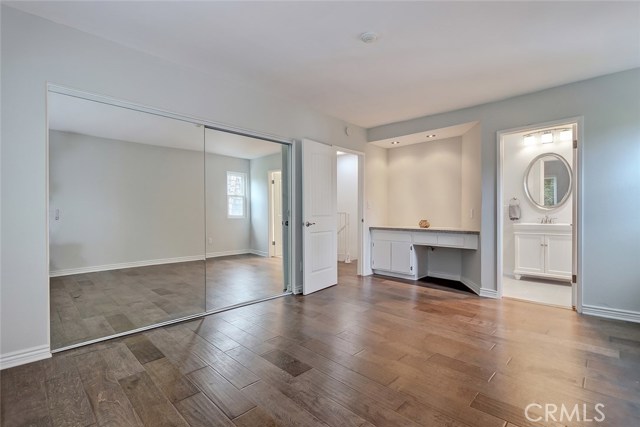 Master bedroom enjoys large vanity/desk area.