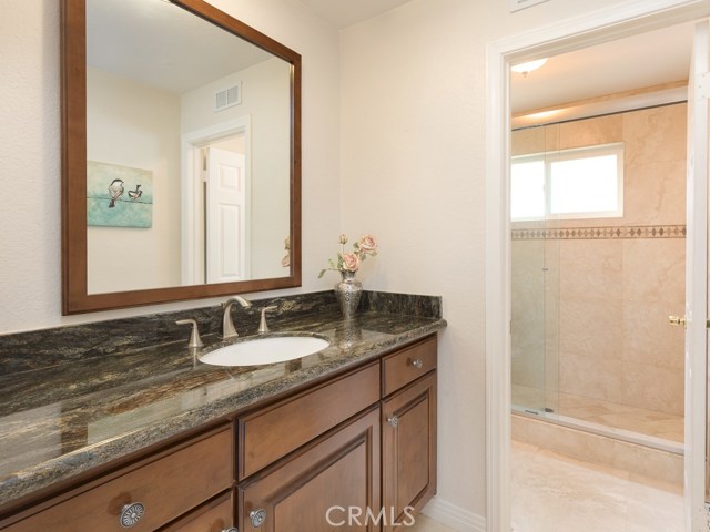 Beautifully remodeled entry level 3/4 bath with walk-in shower.
