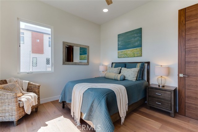 3rd bedroom with walk-in closet & patio with city view