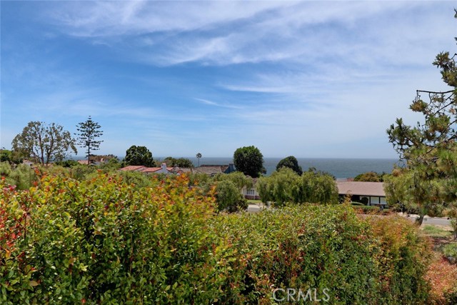 View the sunset over the ocean from the master suite balcony.