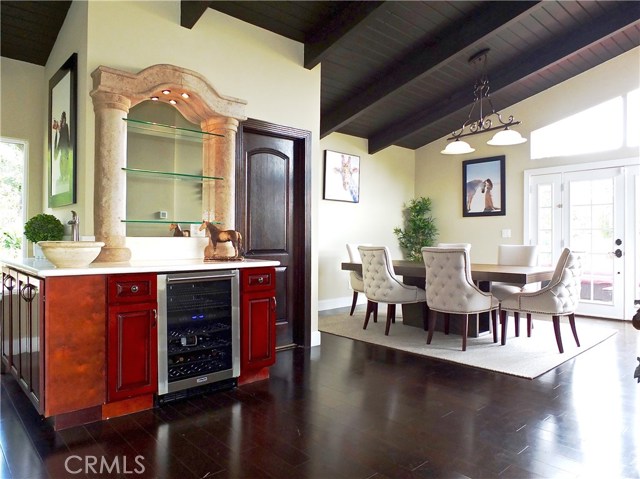 Wine refrigerator and wet bar. Dining room has direct access to the deck