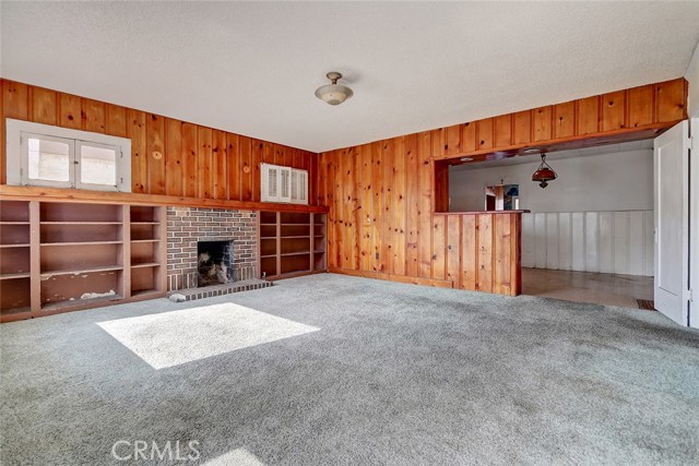 family room with adjacent kitchen and dining room