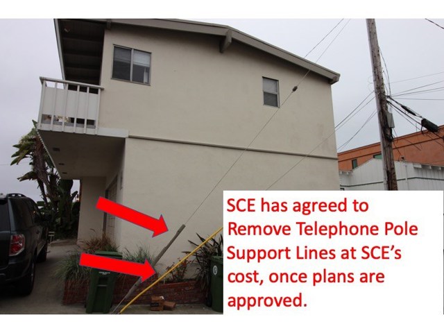 The Souther California Edison, Manhattan Beach Planner inspected the poles and send me an email stating Edison will remove the support lines (at their cost) if there are approved plans to build. This enables a garage from 6th Place and a superior floorplan.