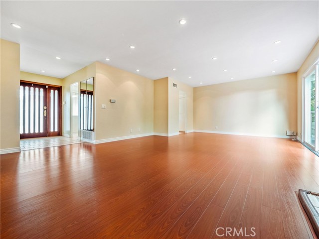 The living room and dining area of 6302 Villa Rosa Drive.