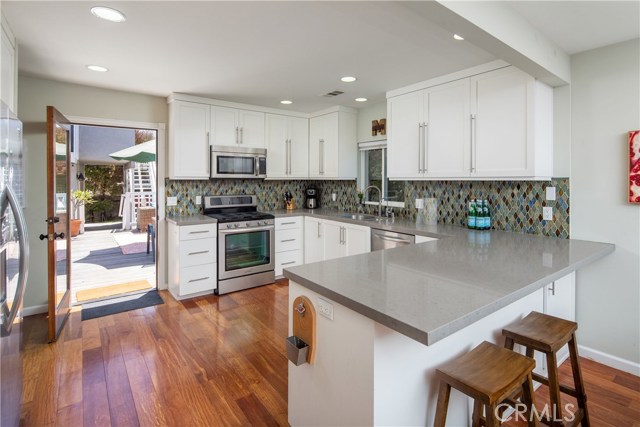 Kitchen leading to redwood deck.