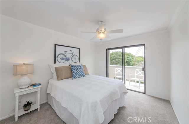 3rd Bedroom on upper level with private balcony