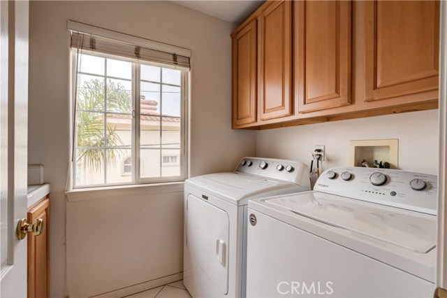 Laundry Room w sink and storage located on floor with 3 bedrooms