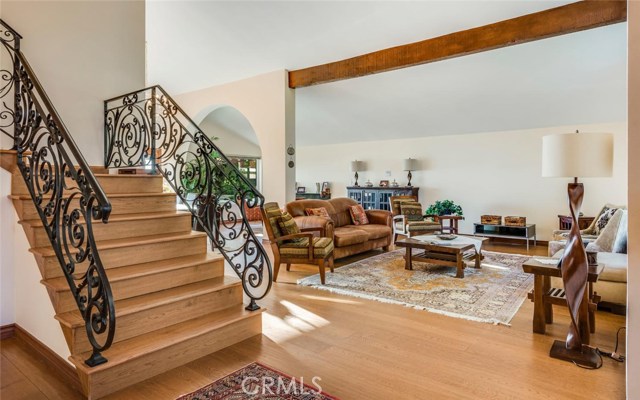 Lovely rod-iron railings and wood floors throughtout.