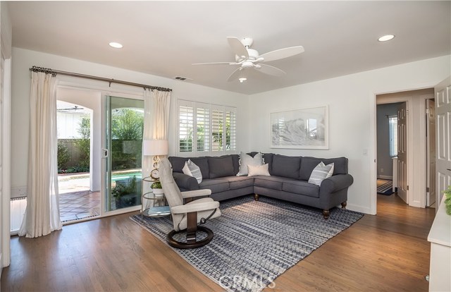 Downstairs bonus living room area with wet bar, laundry