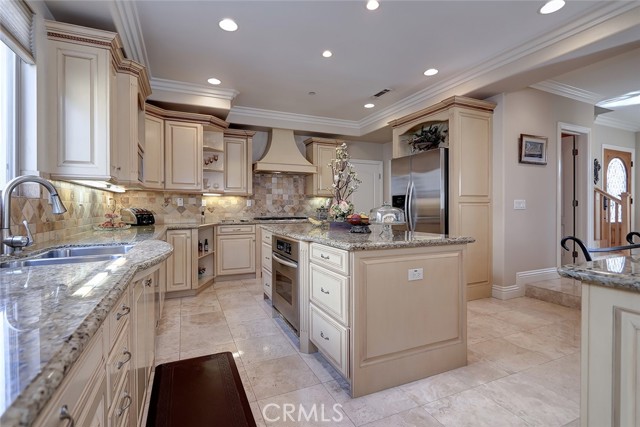 Gorgeous kitchen! You won't find many kitchens like this in a two on a lot! Spacious, gorgeous cabinetry, huge center island plus a full breakfast bar!
