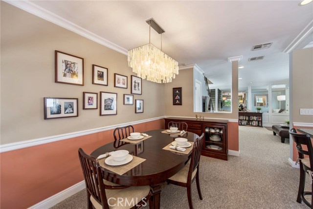 Dining room adjacent to the kitchen and living room