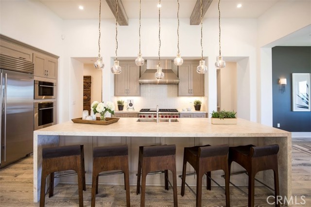 A2 model home, which is the same floorplan as the home being built at 18 Phillips Ranch Road. Sub-zero refrigerator & built in Wolf Range/double ovens plus a microwave are included.