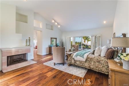 Master bedroom is over 950sf featuring fireplace, vaulted ceilings, sliding doors to courtyard.