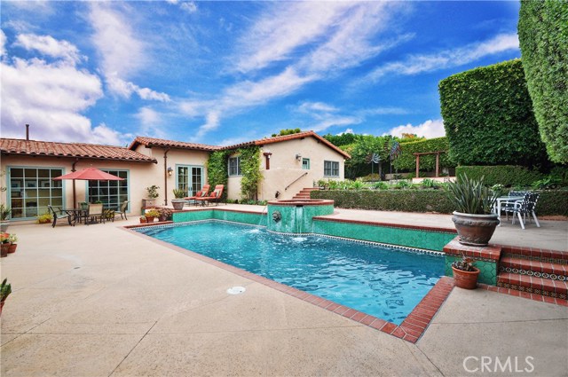 Gorgeous and sparkling remodeled Pool/Spa with expansive Patio area and two grassy back yard lawns.