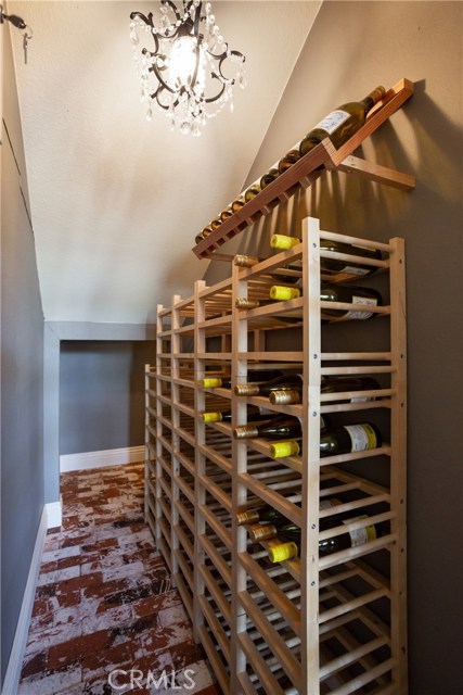 Entry Closet Off Foyer Being Used for Wine Storage.