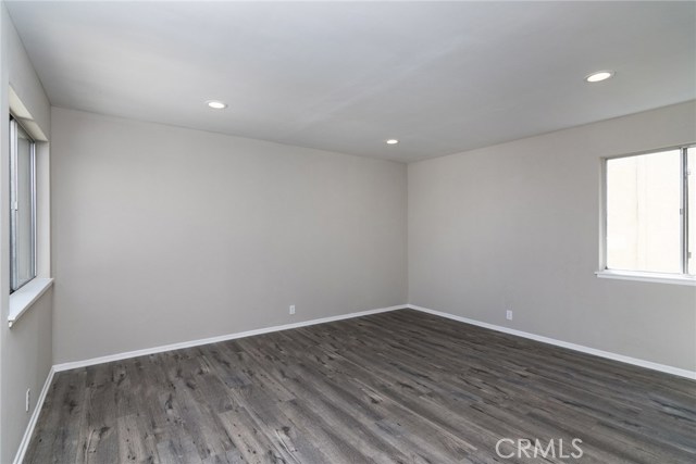 Spacious Master Bedroom with two large windows, two closets and master bathroom