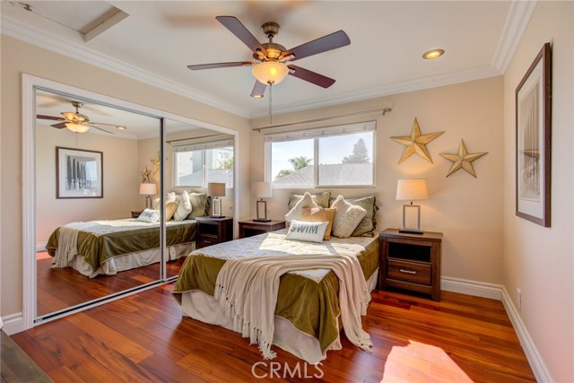 Bedroom # 3. Check out those luxurious Brazilian Koa floating floors! These high end engineered hardwood floors have been installed throughout the entire home to provide a perfect soundproof. They also come with 100 year warranty!
