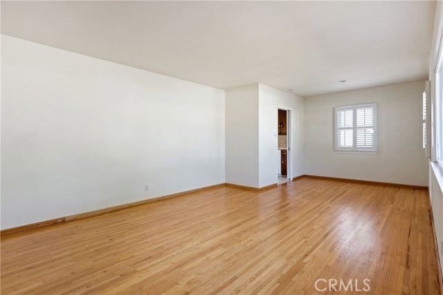 The Original Hardwood Floors Extremely Well Maintained.  The original family room.