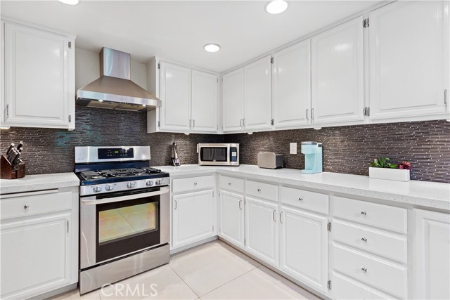 Upgraded  Kitchen with Quartz Counters and Stainless Steel appliances