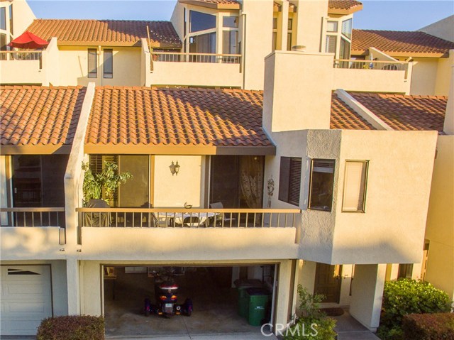 Stunning upgraded townhome in the prestigious Lake front community of Finisterra on the lake, 2... Primary Photo for Listing #OC17097940