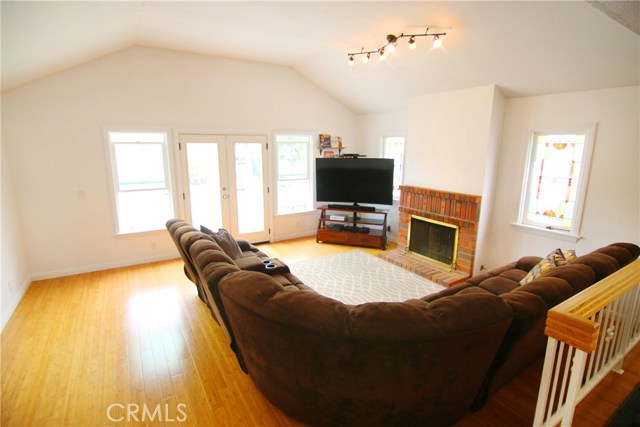 Open up the french doors to your front balcony and take pleasure in the ocean breeze in this oversized family room.