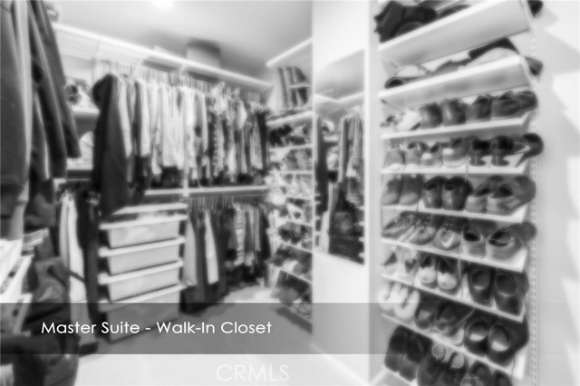 walk in closet with Elfa closet organization