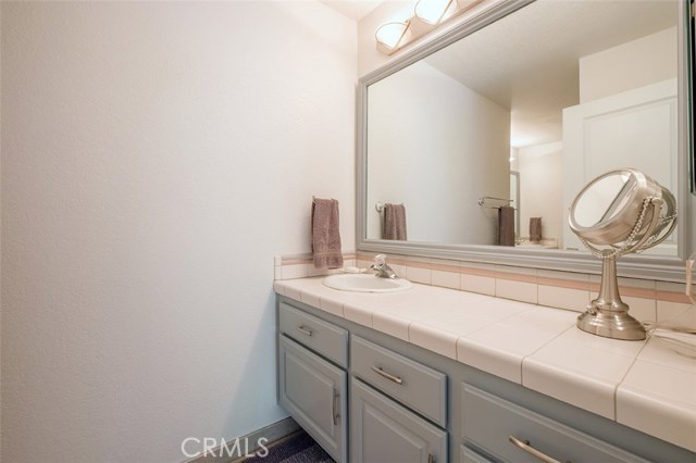 One of two separate vanities in the Master Bathroom