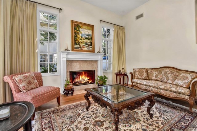 Formal Living Room with Fireplace & High Ceiling
