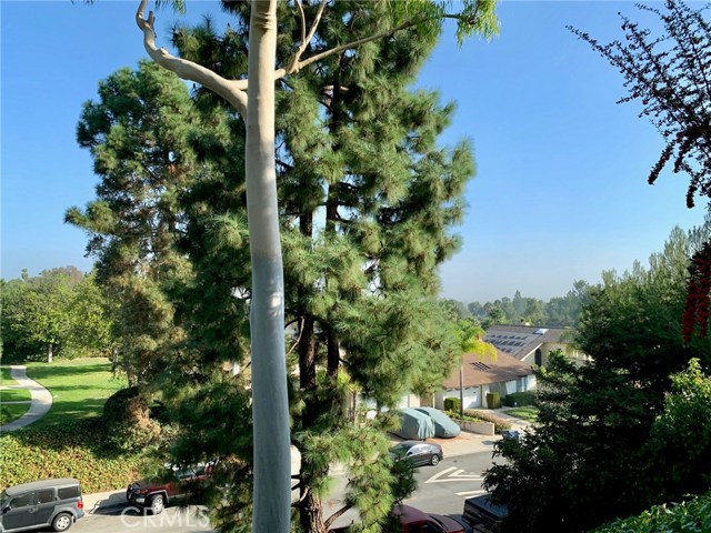 Lots of open green space and views to the north east. Located on the greenbelt at the edge of the complex, high above your surroundings. Only one neighbor nearby.