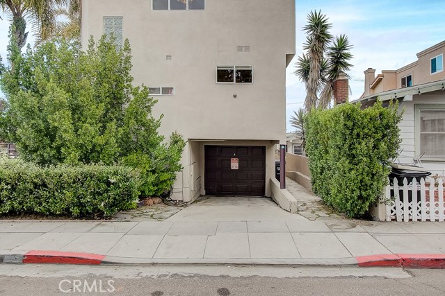 One extra deep garage entrance on Manhattan Ave. with long driveway to park even your large SUV's....then a BONUS one car deep garage at the alley with another driveway to fit a total of 4 Cars PLUS 2 permits for off street parking!